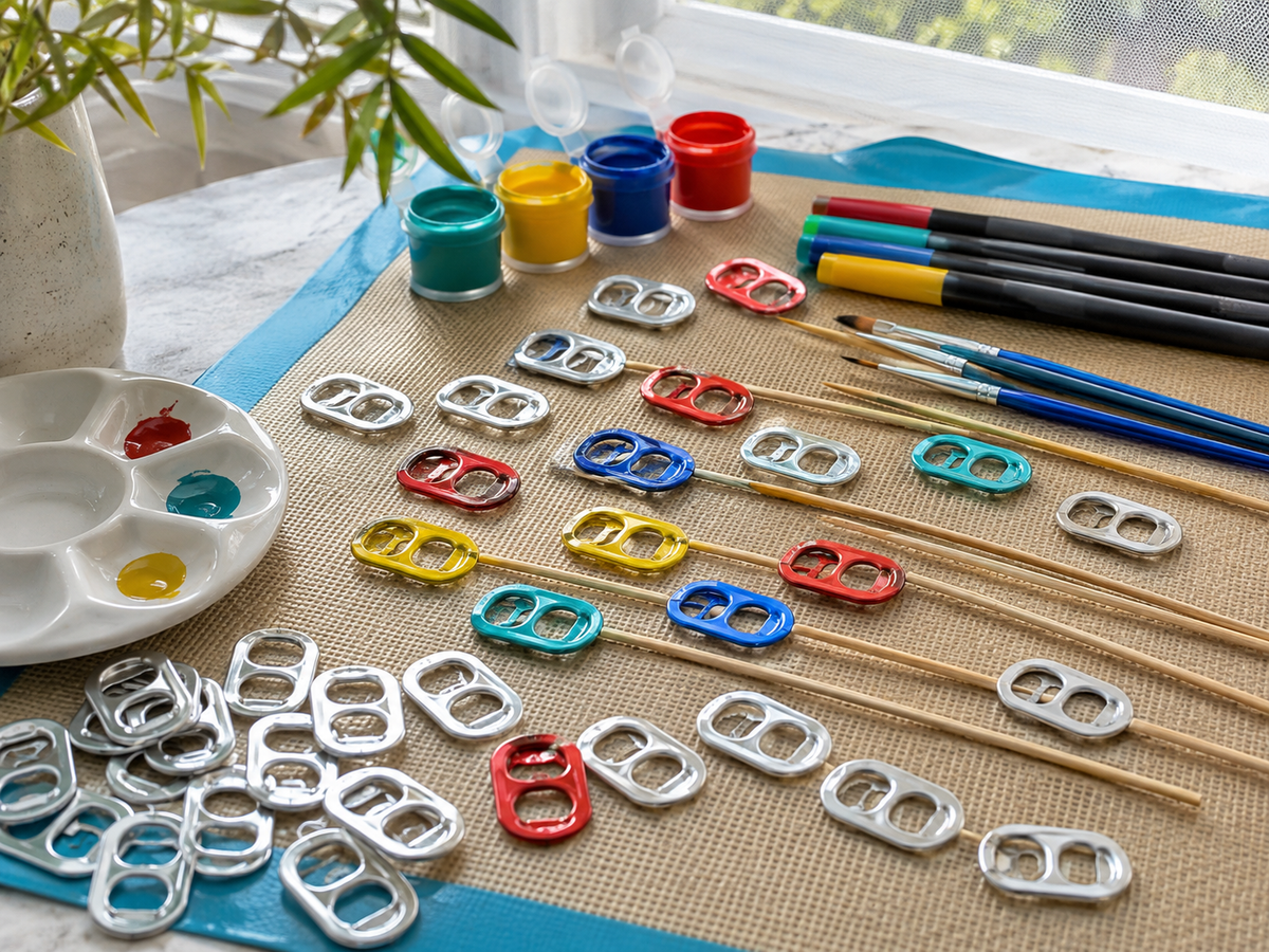 Aluminum pop tabs shown in a craft, classroom, or collection project