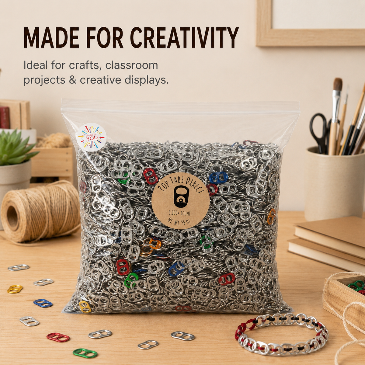 Aluminum pop tabs shown in a craft, classroom, or collection project