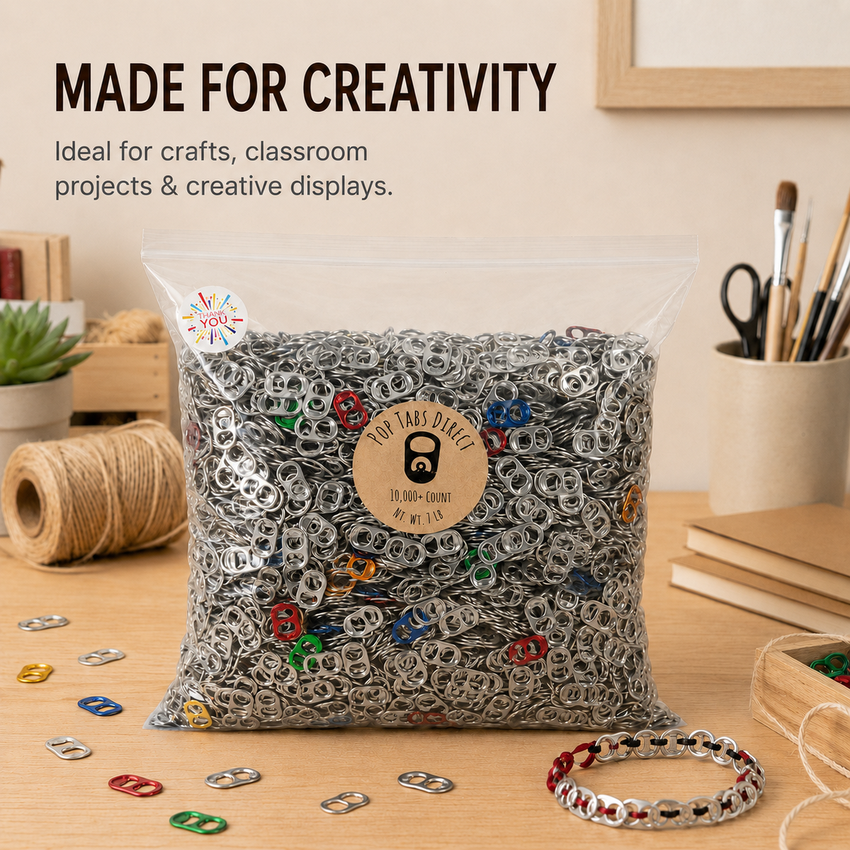 Aluminum pop tabs shown in a craft, classroom, or collection project